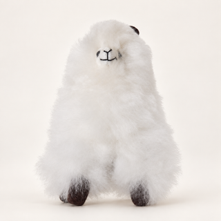 Peluche alpaga blanche de 15 cm, vue de face sur fond crème